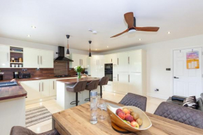Modern 4 bedroom family home with driveway parking